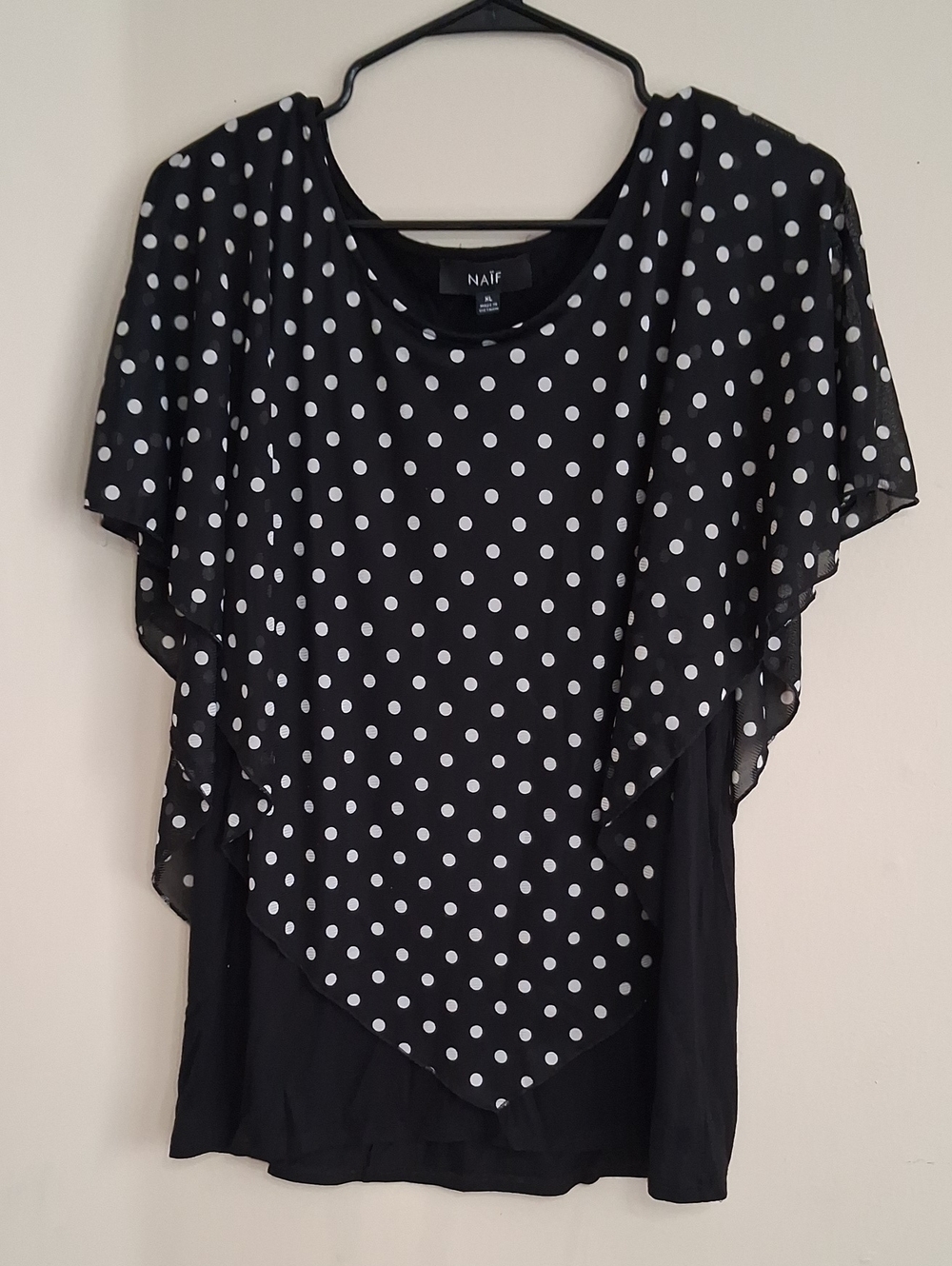 NAIF Black Blouse with White Polka Dot Overlay